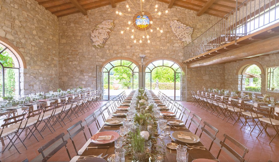 wedding dinner setting in an indoor room in a dream hamlet in tuscany