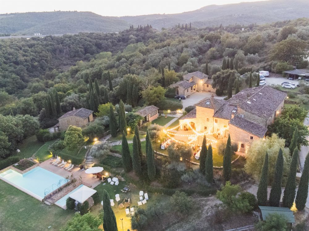 Aerial night view of wedding hamlet in Siena