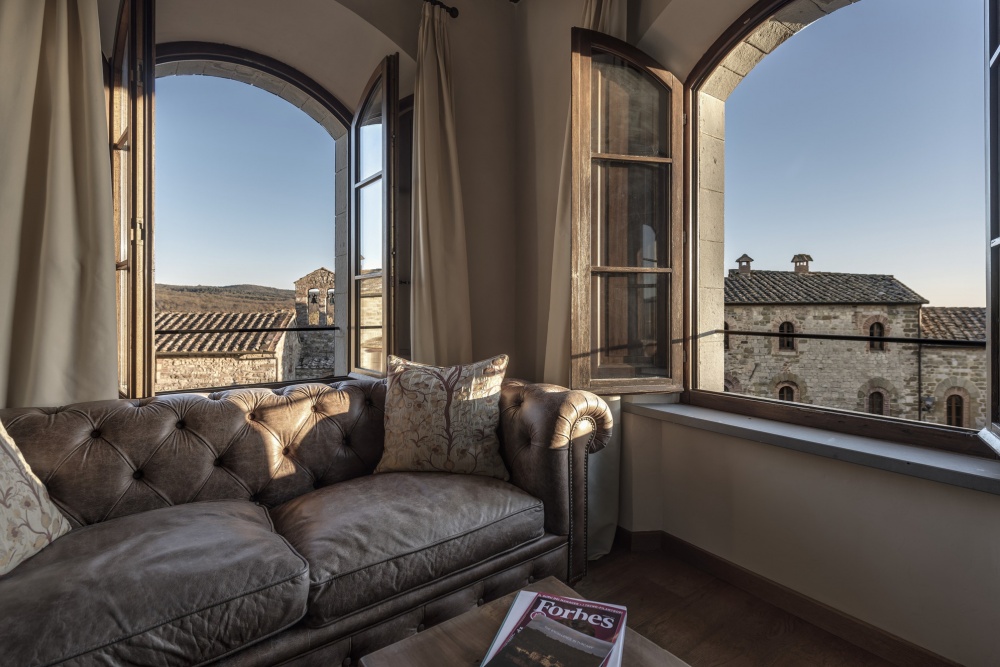 Bedroom with view at luxury wedding resort in Tuscany