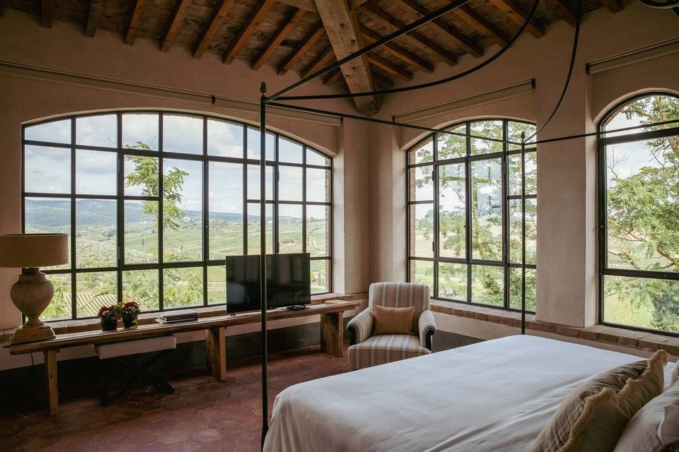 Bedroom with a view at the villa for wedding in Tuscany