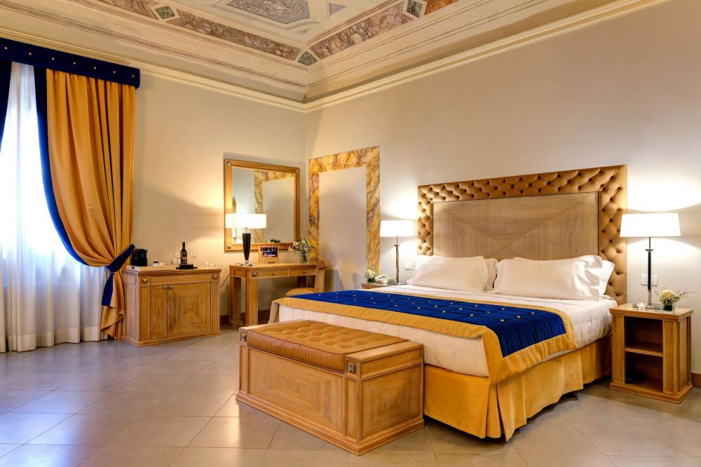 Blue and yellow room at luxury resort for marriage in Florence