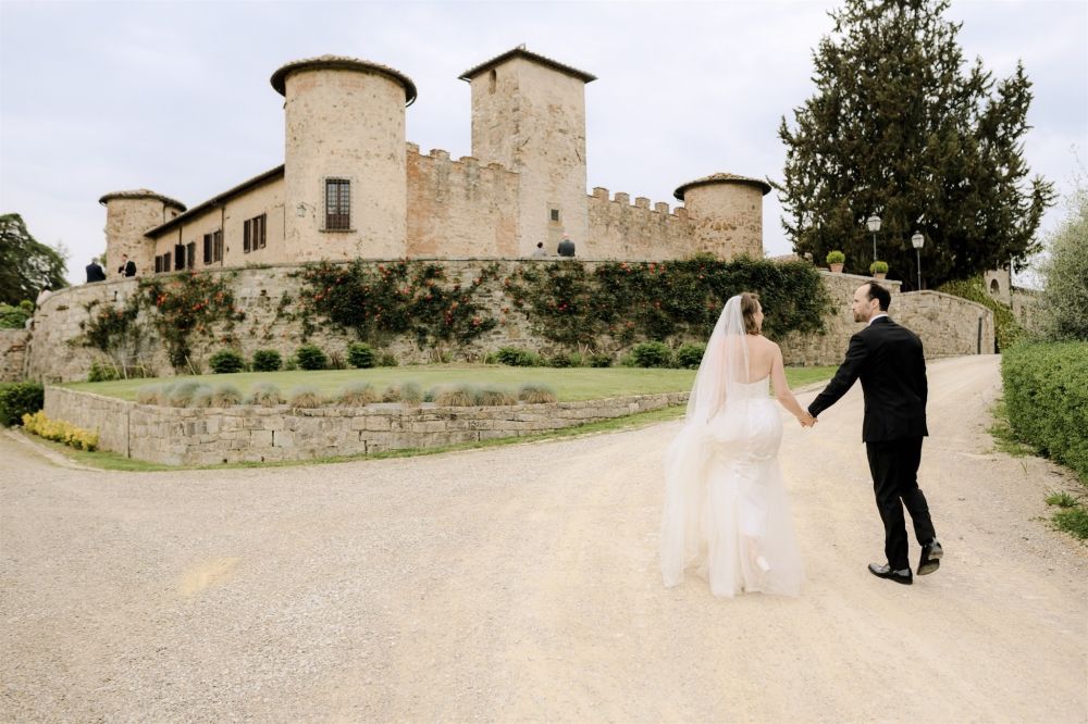 Bride and groom at luxury wedding castle in Chianti