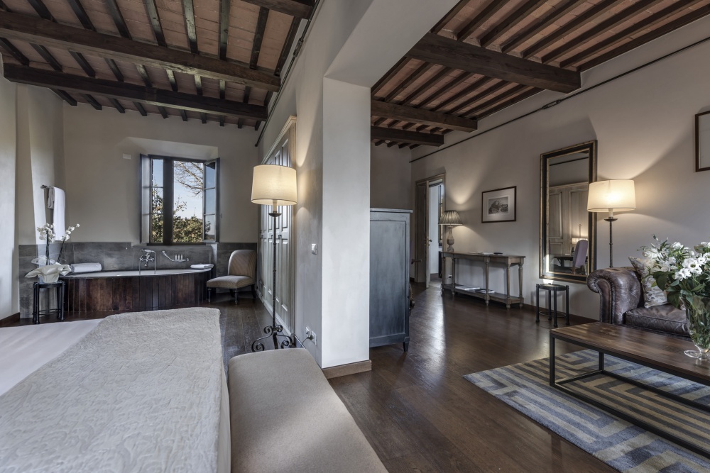 Brown bedroom at luxury wedding resort in Tuscany