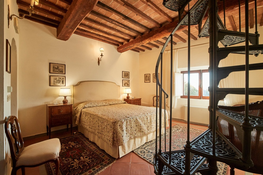 Cosy bedroom at wedding hamlet in Tuscany