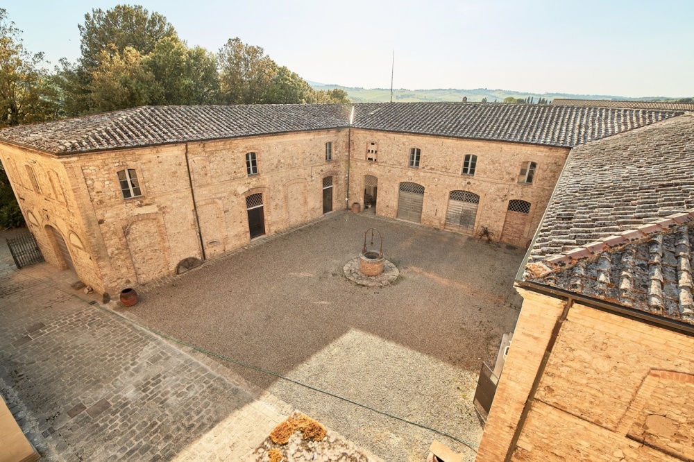 Courtyard at wedding hamlet in Tuscany