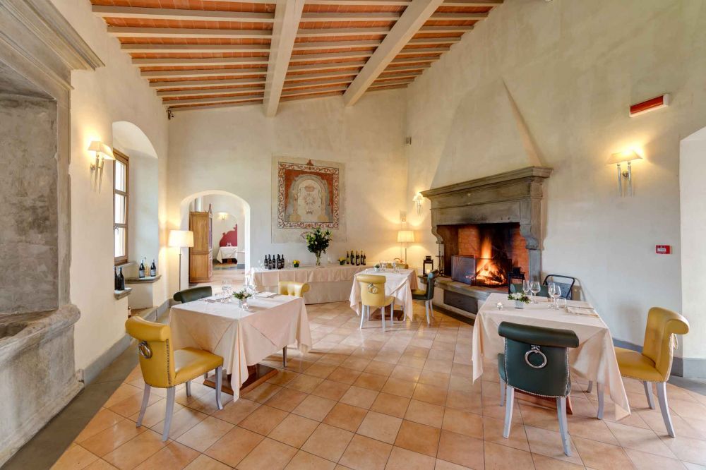 Dining room with fireplace at luxury resort for marriage in Florence