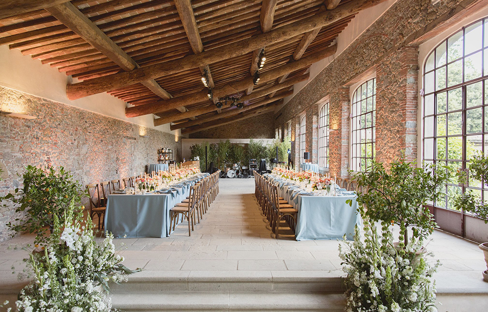 Dinner tables and dance floor at villa in Lucca for wedding receptions