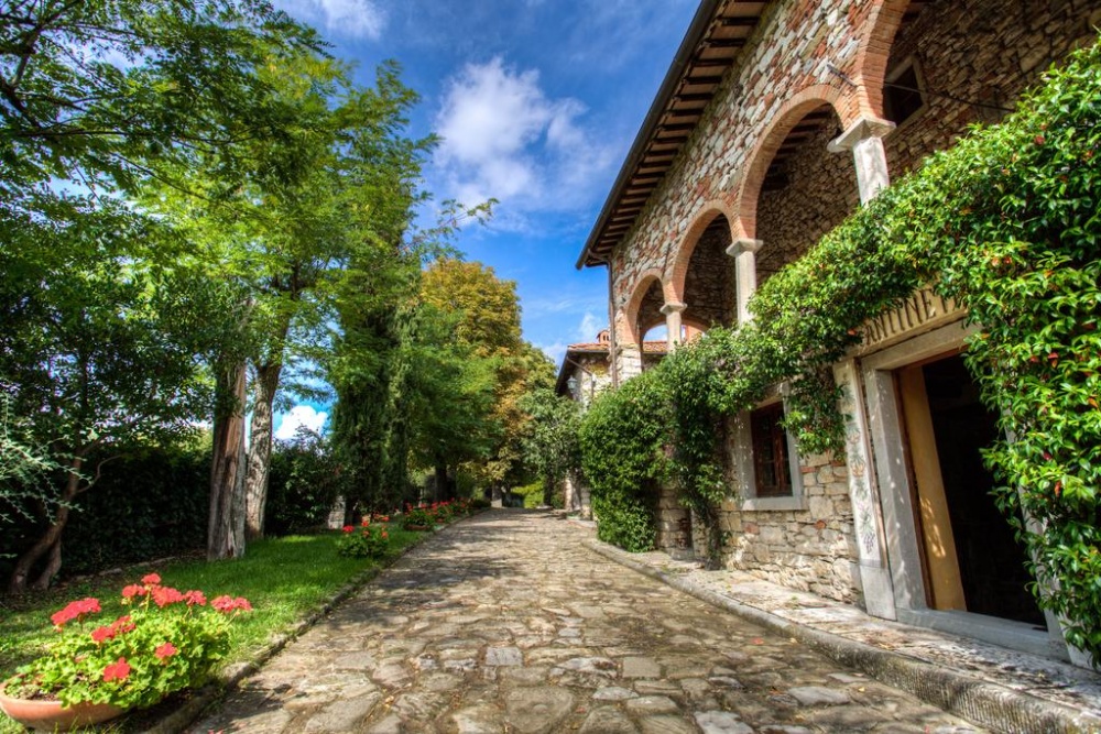 dream wedding hamlet with greenery in tuscany