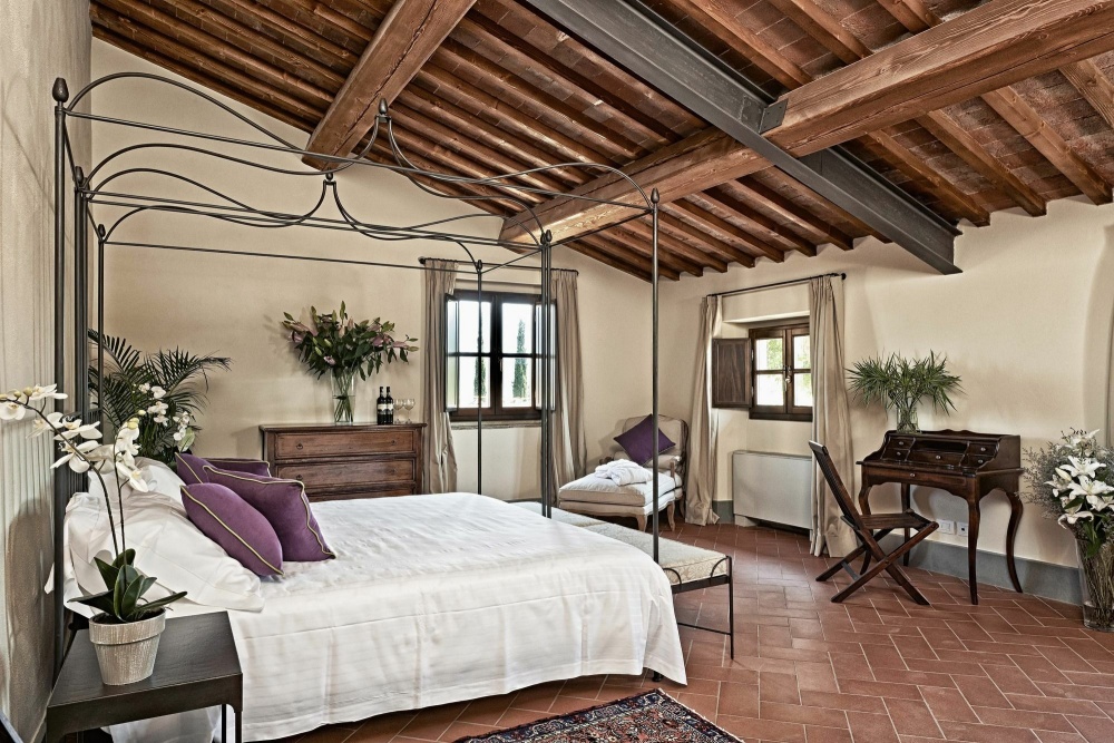 Four poster bedroom at wedding rustic villa in Tuscany