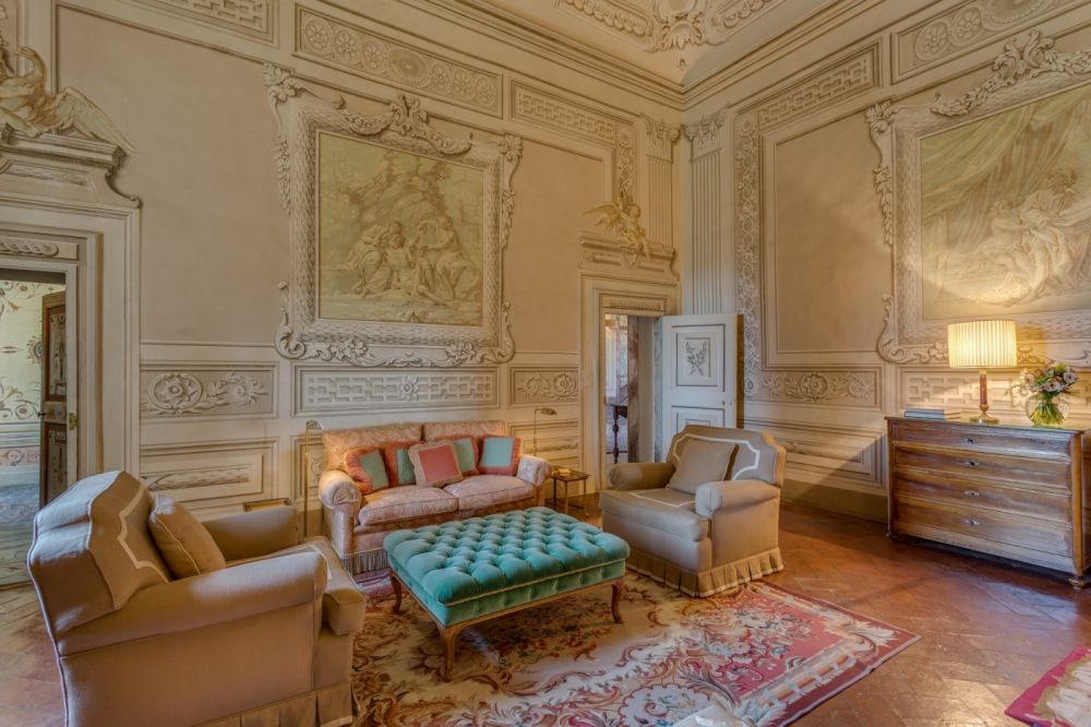 Living room with frescoes at the villa in Florence