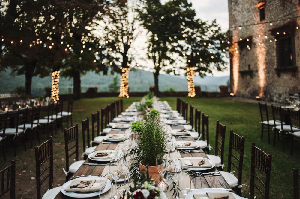 wedding table setting in a medieval castle in chianti tuscany