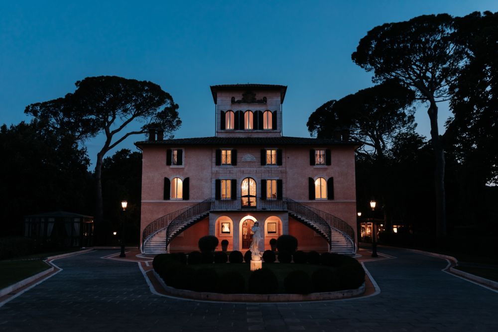 Night view of facade at elegant wedding villa in Tuscany