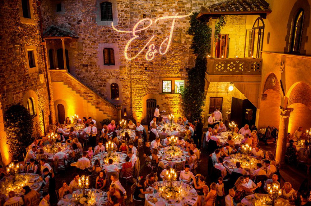 Wedding dinner by night at the Medieval castle in Tuscany