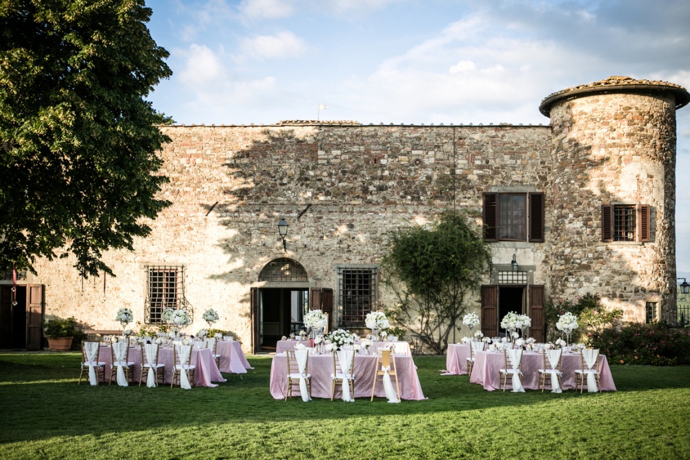 Pink table set up at luxury wedding castle in Chianti