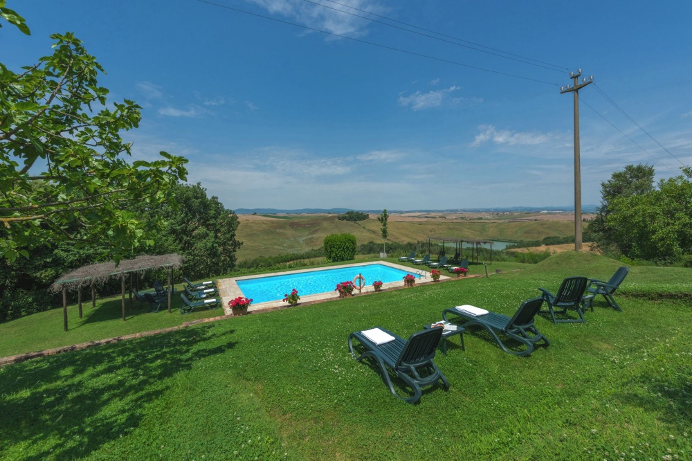 pool lake and garden for relax at romantic farmhouse in siena tuscany