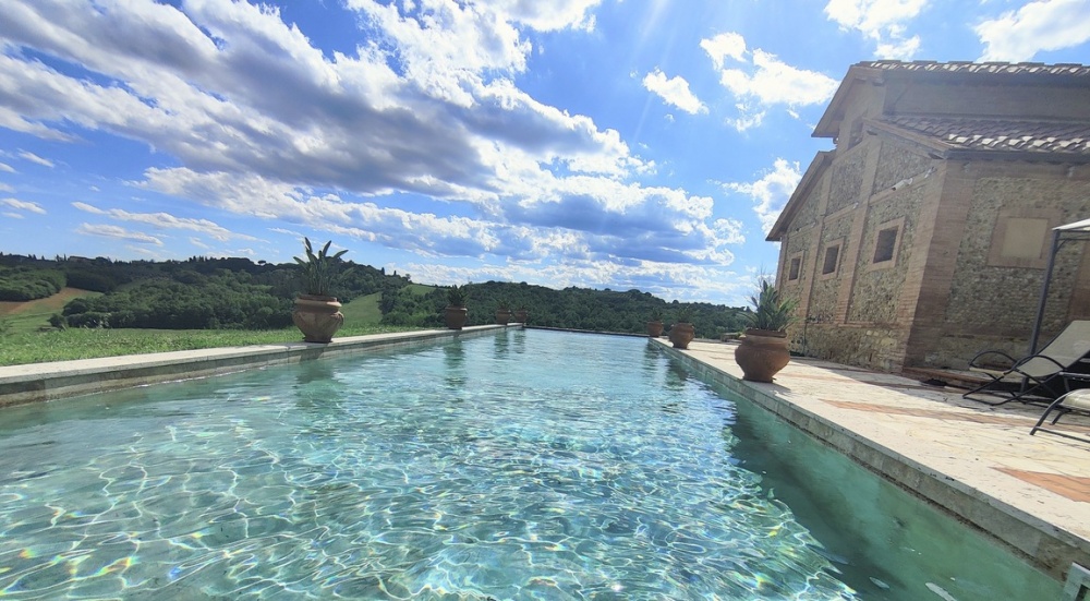 Pool of villa at wedding hamlet in Tuscany