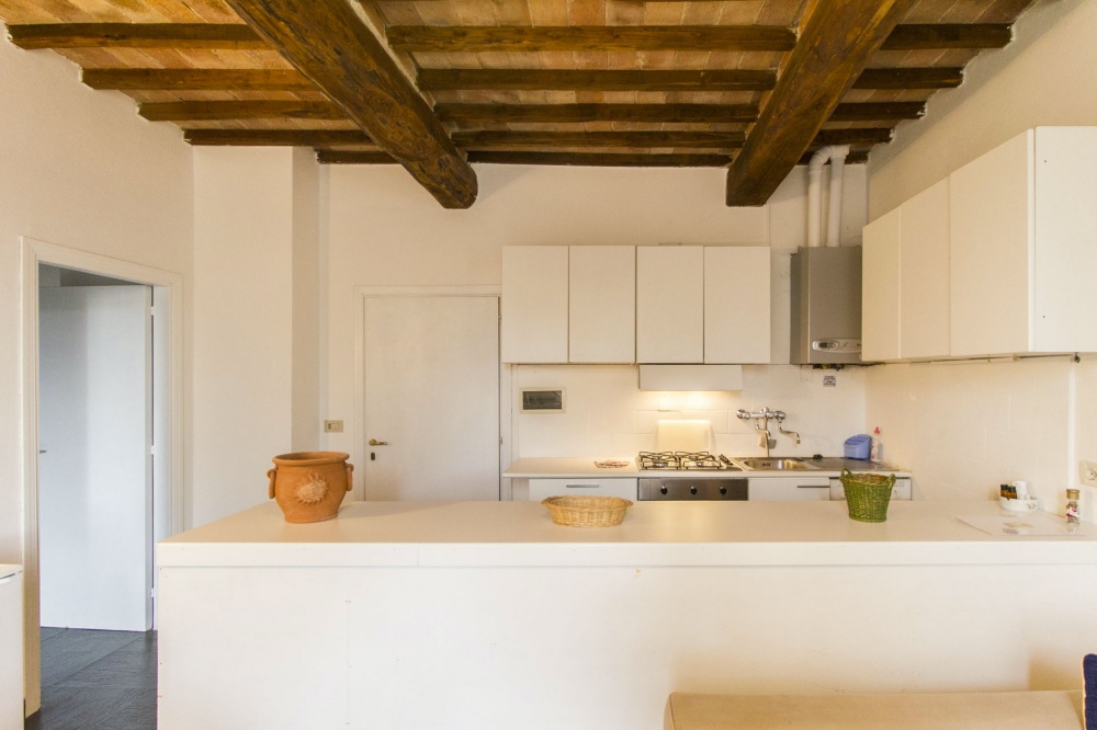 refined kitchen of an apartment at the romantic farmhouse near siena