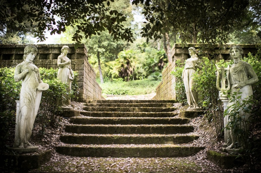 Statues in the garden at wedding hamlet in Tuscany