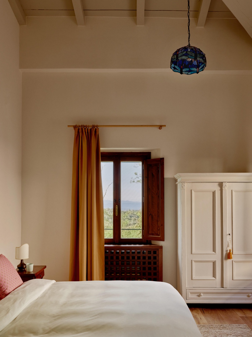 View of bedroom at organic farmhouse for weddings in Tuscany