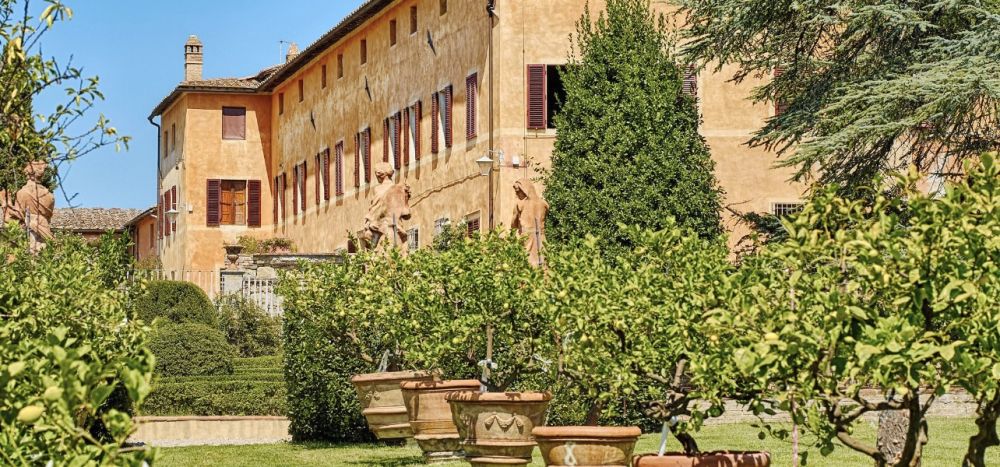 View of the lemons and the facade of the wedding villa in Siena