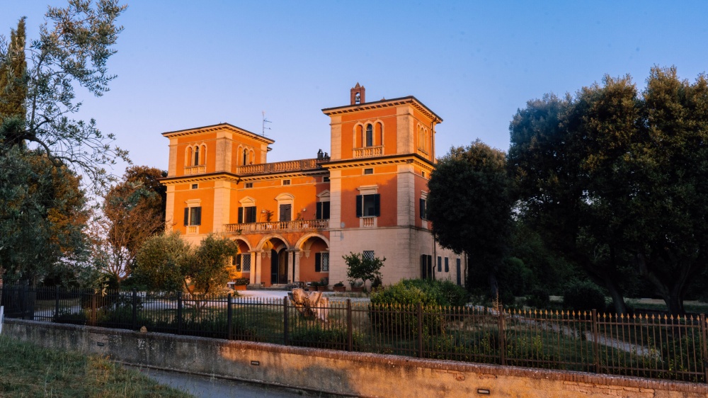 View of main villa at organic farmhouse for weddings in Tuscany