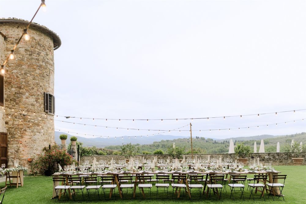 View tables and lights at luxury wedding castle in Chianti
