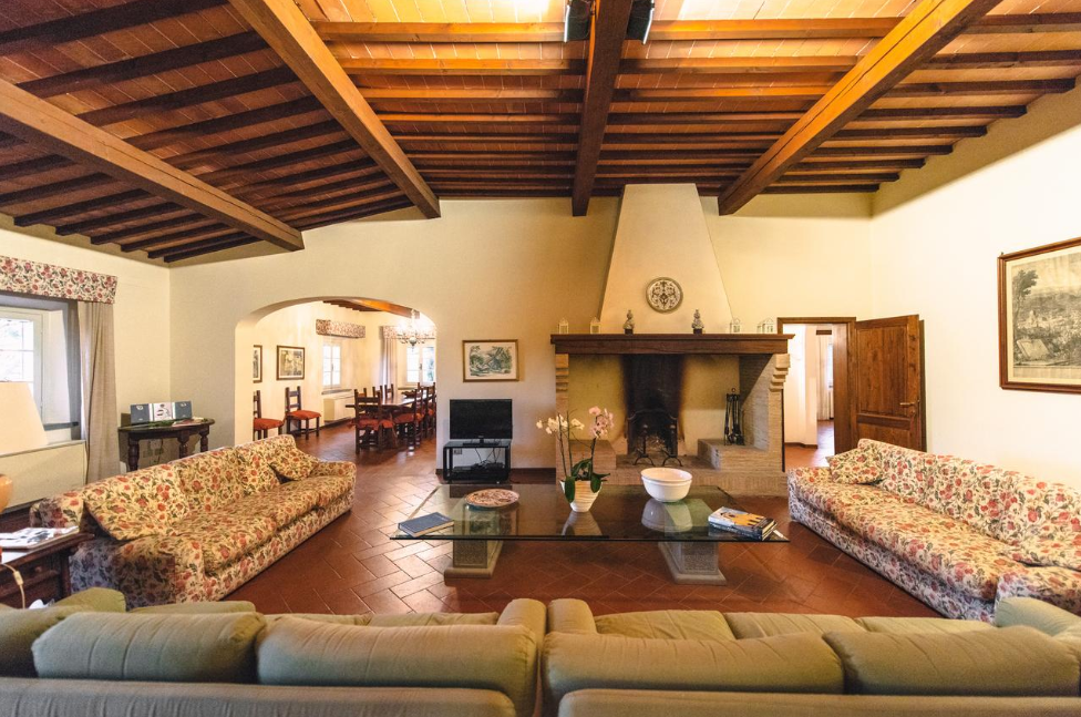 fireplace in the living room of a villa for weddings on the tuscan hills