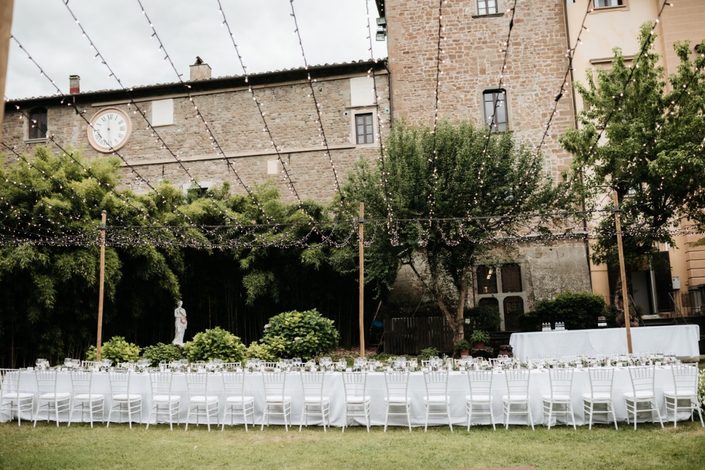 Wedding dinner with fairy lights at wedding villa in Florence