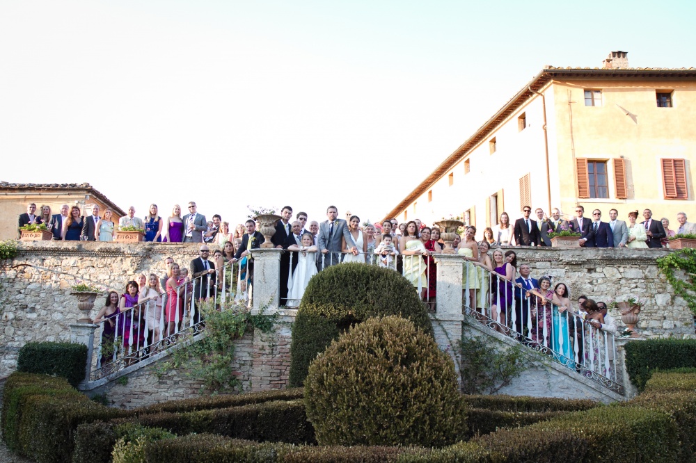 real wedding photo on the stairs of a villa in siena