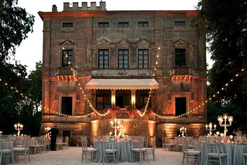 front view of a wedding dinner setting in a villa with bulblights